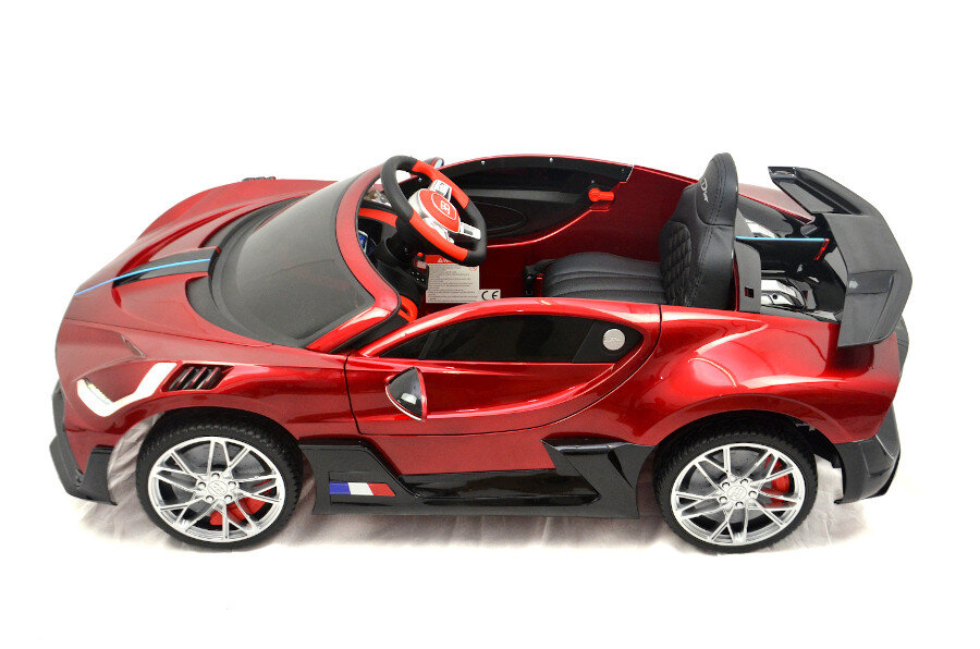 Elektro Kinderfahrzeug "Bugatti Divo" - lizenziert - 12V - 2,4Ghz Ferngesteuert, MP3, Ledersitz+EVA+Lackiert 12 Elektro Kinderfahrzeug "Bugatti Divo" - lizenziert - 12V - 2,4Ghz Ferngesteuert, MP3, Ledersitz+EVA+Lackiert – Bild 12