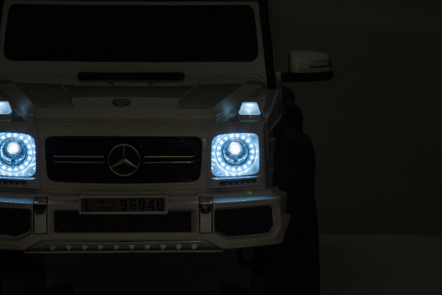 Kinderfahrzeug - Elektro Auto "Mercedes G63 AMG 6x6" - lizenziert - 12V7AH Akku + 2,4Ghz+Ledersitz+EVA 5 Kinderfahrzeug - Elektro Auto "Mercedes G63 AMG 6x6" - lizenziert - 12V7AH Akku + 2,4Ghz+Ledersitz+EVA – Bild 5