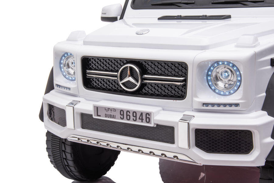 Kinderfahrzeug - Elektro Auto "Mercedes G63 AMG 6x6" - lizenziert - 12V7AH Akku + 2,4Ghz+Ledersitz+EVA 8 Kinderfahrzeug - Elektro Auto "Mercedes G63 AMG 6x6" - lizenziert - 12V7AH Akku + 2,4Ghz+Ledersitz+EVA – Bild 8