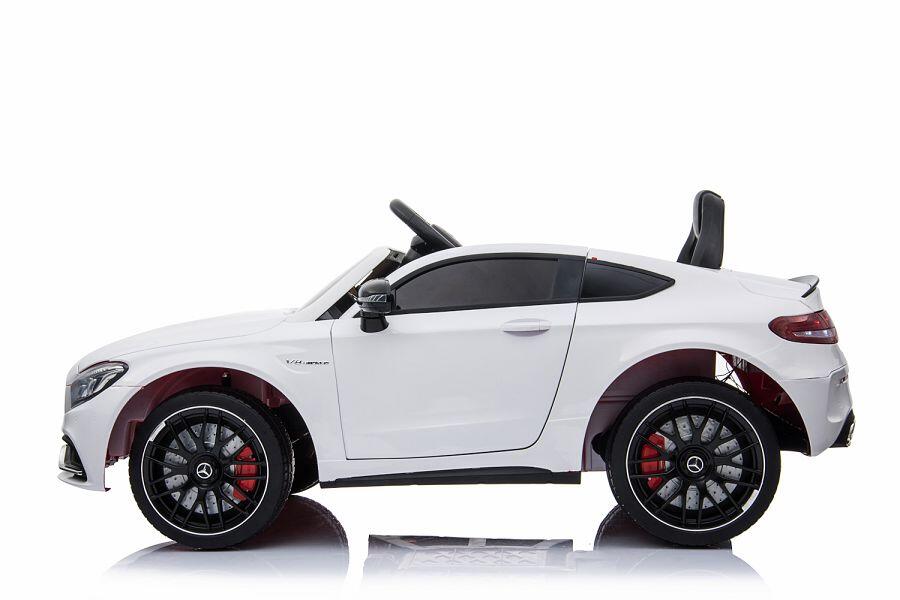 Kinderfahrzeug - Elektro Auto "Mercedes C63 AMG" - lizenziert - 12V7AH Akku + 2,4Ghz+Ledersitz+EVA -Weiss 6 Kinderfahrzeug - Elektro Auto "Mercedes C63 AMG" - lizenziert - 12V7AH Akku + 2,4Ghz+Ledersitz+EVA -Weiss – Bild 6