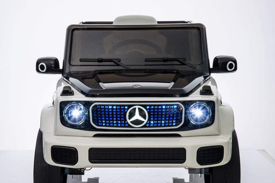 Kinderfahrzeug - Elektro Auto "Mercedes EQG AMG" - Lizenziert - 12V9AH Akku,4 Motoren- 2,4Ghz Fernsteuerung, MP3+Ledersitz+EVA 4 Kinderfahrzeug - Elektro Auto "Mercedes EQG AMG" - Lizenziert - 12V9AH Akku,4 Motoren- 2,4Ghz Fernsteuerung, MP3+Ledersitz+EVA – Bild 4